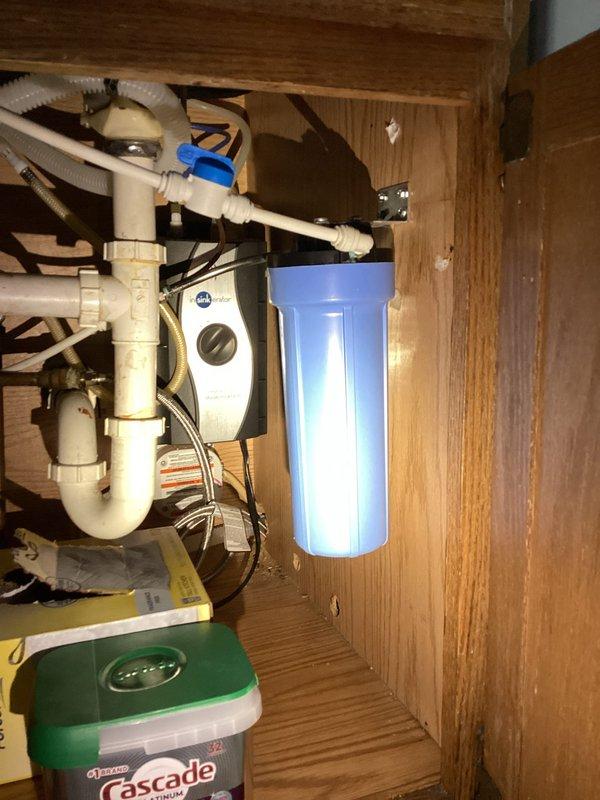 Responded to service call for slow bathroom sink drain, outdoor spigot leak, and shower head installation. Cleared bathroom sink drain obstruction to restore proper flow. Replaced corroded outdoor hose bib that exhibited turquoise oxidation and active leaking. Installed new shower head per customer request. All fixtures tested and confirmed operational upon completion.