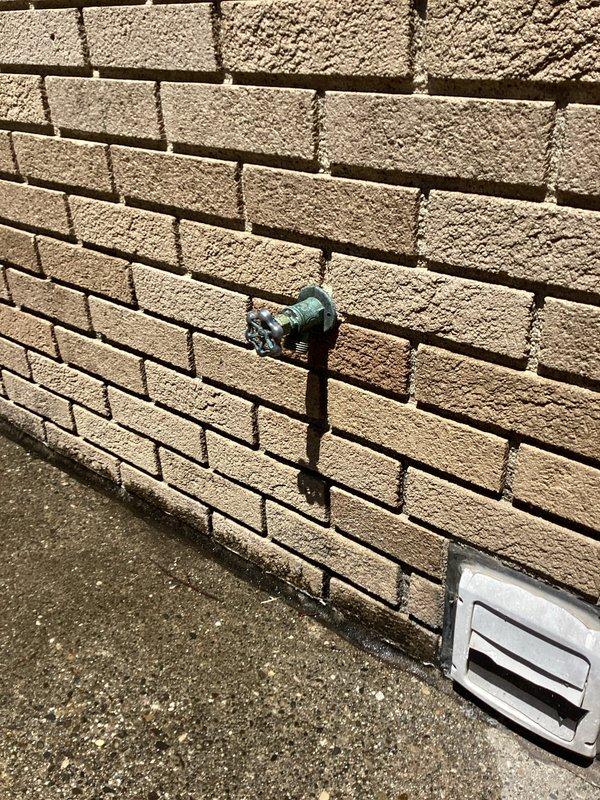 Responded to service call for slow bathroom sink drain, outdoor spigot leak, and shower head installation. Cleared bathroom sink drain obstruction to restore proper flow. Replaced corroded outdoor hose bib that exhibited turquoise oxidation and active leaking. Installed new shower head per customer request. All fixtures tested and confirmed operational upon completion.
