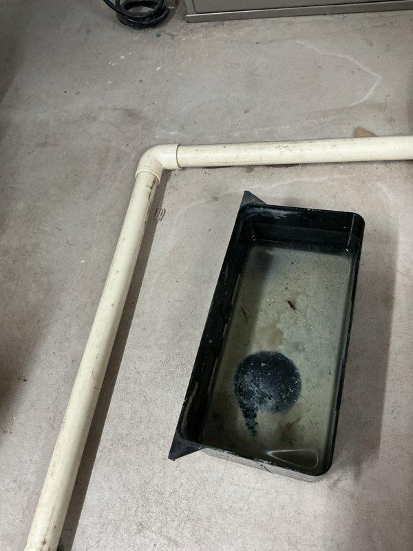 Completed annual cooling system tune-up and maintenance inspection as part of 2-year energy warranty program. Performed comprehensive system evaluation including refrigerant levels, electrical connections, condensate drainage, and overall unit performance. Documented condensate drain pan operation and monitored for proper drainage, noting water collection in emergency overflow pan positioned on basement floor near PVC drain line. System operating within normal parameters following preventative maintenance service.
