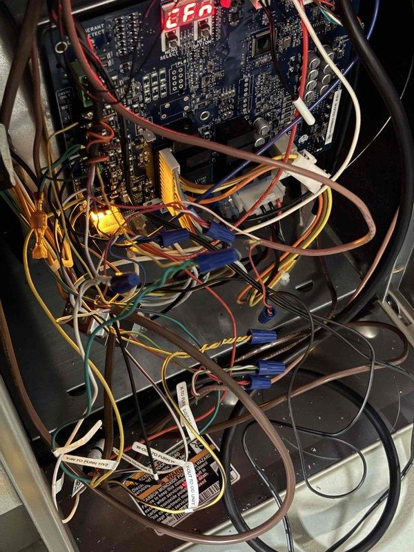 Responded to customer concern regarding continuous air flow from vents when AC system was turned off on newly installed Carrier unit. Upon inspection, verified system operation and examined control board and wiring configuration. Determined air flow was normal system operation due to fan settings on thermostat. Educated customer on proper system operation, explained difference between AUTO and ON fan settings, and demonstrated how to adjust thermostat controls to eliminate continuous air circulation when cooling is not active. System heating and cooling functions tested and operating within normal parameters. No mechanical defects found.