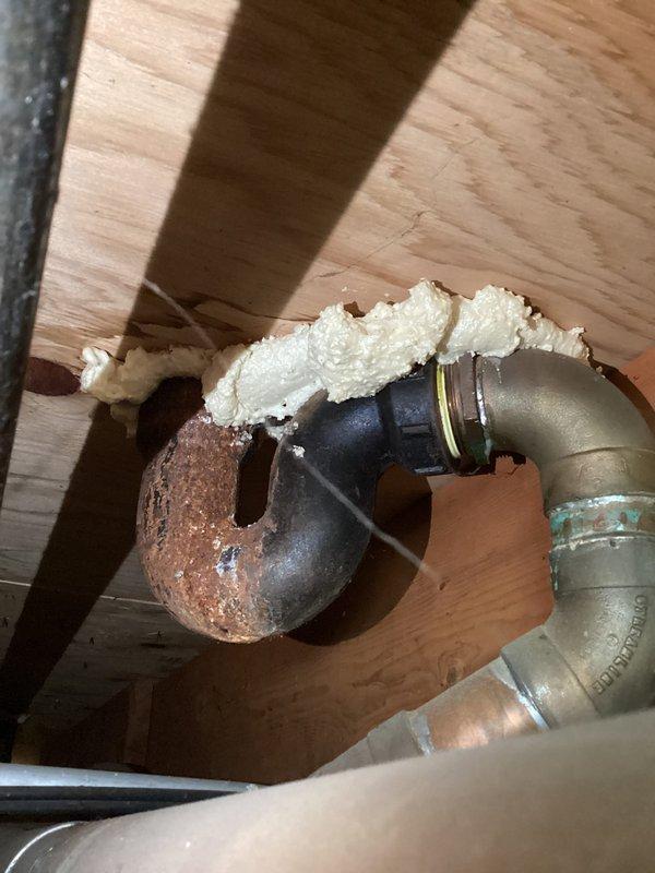 Responded to bathroom faucet experiencing low water pressure with spurting and spraying issues. Upon inspection, identified corroded plumbing components in the under-floor access area affecting water flow. Addressed the compromised connections and verified proper water pressure restoration to the faucet fixture.
