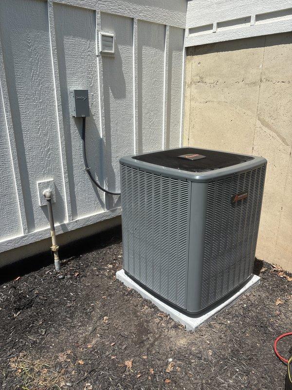 Completed full system replacement of residential furnace and air conditioning unit. Installed new Amana furnace in basement utility area with proper PVC venting configuration and mounted on code-compliant platform. Installed new outdoor condenser unit on concrete pad in side yard with proper electrical disconnect, refrigerant line routing, and secure positioning against exterior walls.