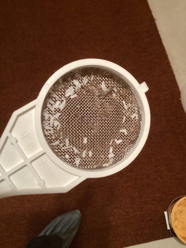 Responded to no hot water complaint on Navien tankless water heater. Upon inspection, found inlet filter screen heavily clogged with sediment and debris, restricting water flow and preventing unit operation. Removed and cleaned inlet filter assembly, clearing accumulated buildup from mesh screen. Inspected flow sensor connector for corrosion and debris, cleaned contact points to ensure proper electrical connection. Reinstalled filter assembly, restored water supply, and verified unit operation with successful ignition and hot water delivery.