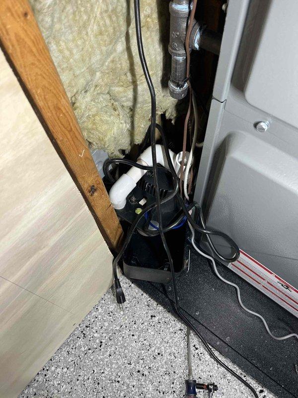 Completed annual cooling maintenance and tune-up on residential AC system. Addressed customer concerns regarding existing Amana smart thermostat displaying inaccurate temperature readings in main room, with current reading showing 76° while cooling to setpoint of 72°. Inspected thermostat wiring installation and noted low-voltage cables routed through exposed wall cavity near floor transition area. Performed standard preventative maintenance procedures on cooling equipment and documented system operation with photos. Discussed thermostat replacement options with customer to resolve accuracy issues.