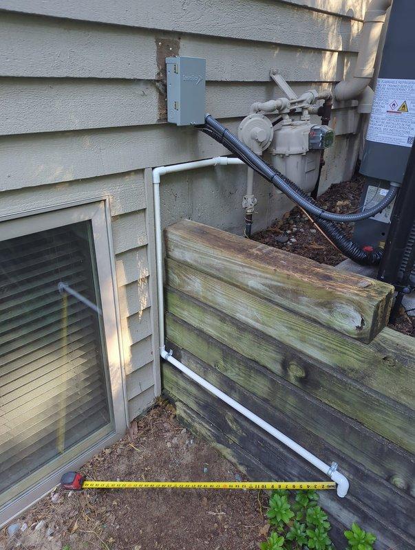 Responded to inspector correction notice regarding gas meter regulator placement in relation to air conditioning condenser unit. Verified clearance measurements between gas piping components and HVAC equipment to ensure compliance with NFPA code requirements mandating minimum 3-foot separation distance. Documented existing installation conditions and confirmed proper spacing between gas meter regulator assembly and condenser unit meets safety standards.