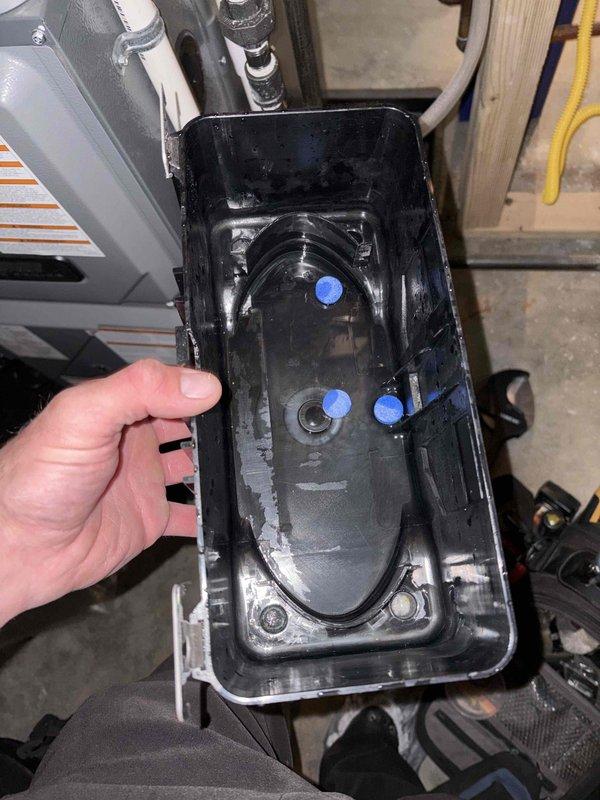 Completed annual cooling maintenance on 2021 EnergiAir system under 2-year warranty agreement. Inspected and serviced condensate drain pan assembly, removed debris and verified proper drainage function through primary and secondary drain lines with blue safety float switches. All HVAC components operating within normal parameters, system ready for cooling season.