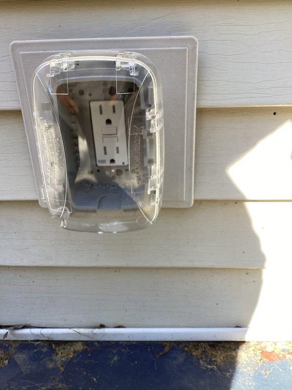 Responded to electrical service call for faulty junction box, damaged wiring, and two malfunctioning GFCI outlets requiring repair or replacement. Inspected interior laundry room outlet and exterior weatherproof GFCI receptacle mounted on building siding. Replaced defective GFCI devices with new tamper-resistant units, repaired compromised wiring connections in junction box, and verified proper ground fault protection on both circuits. Tested all outlets for correct operation and confirmed compliance with electrical safety standards.