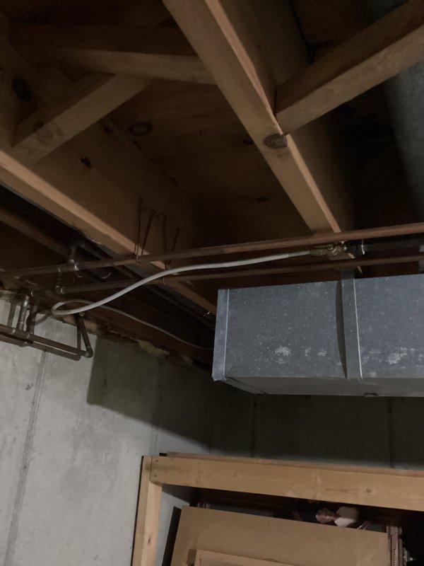 Provided comprehensive estimate for gas line modification to serve dryer appliance in 1969 stick-built home with accessible basement. Project scope includes removing existing flexible copper compression line configuration and installing solid black gas pipe extension from basement through floor to dryer area, new shutoff valve at appliance location, and code-compliant flexible dryer hookup line. Assessment confirmed no active gas leaks, safety concerns, or appliance malfunctions present in current installation.