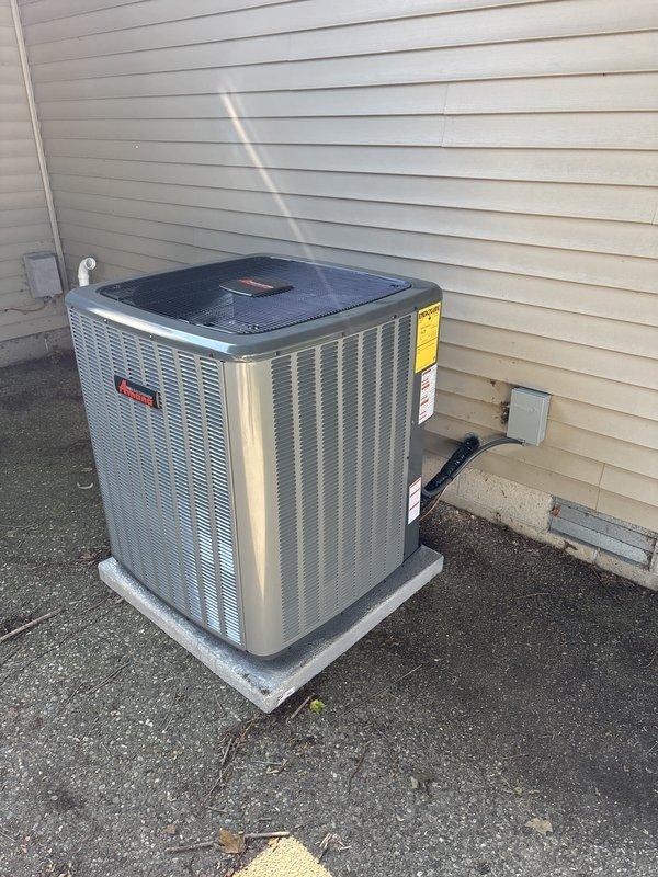 Completed full HVAC system replacement including outdoor Trane condenser unit and indoor air handler components. Installed new condensing unit on exterior concrete pad with proper electrical disconnect and conduit connections, along with refrigerant line set and condensate drainage piping. Interior installation included new air handler positioned in basement utility area with integrated furnace system, properly configured PVC venting, electrical connections, and ductwork integration to existing distribution system.