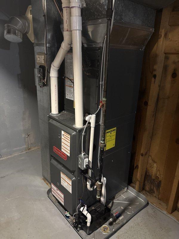 Completed full HVAC system replacement including indoor furnace unit and outdoor condensing unit. Installed new furnace in basement utility area with proper PVC exhaust and intake venting, established all necessary electrical connections, and integrated sheet metal ductwork with existing distribution system. Positioned outdoor condensing unit on concrete pad with proper clearances, completed refrigerant line connections, installed electrical disconnect, and verified system operation with startup procedures.