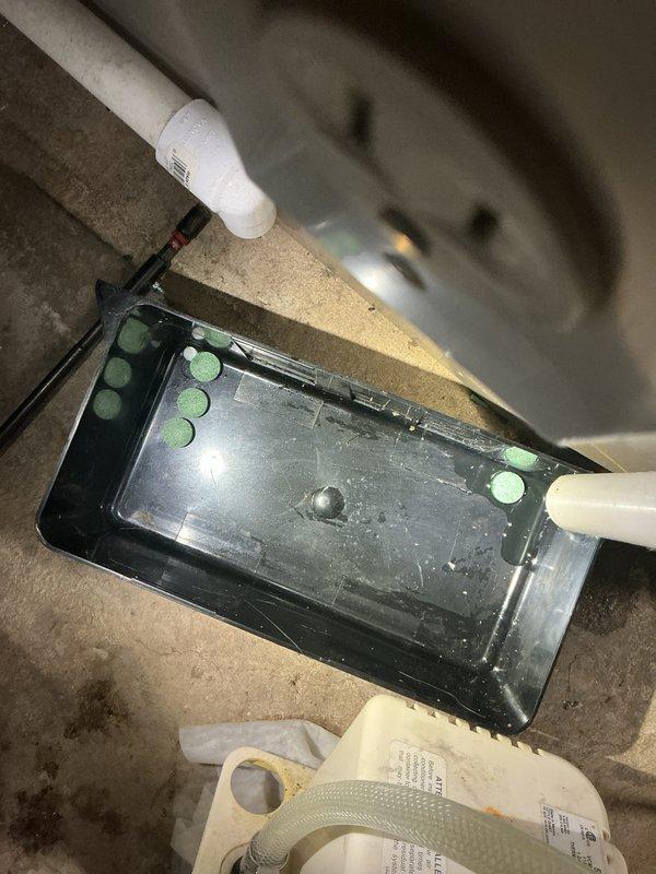 Completed comprehensive AC Super Tune-up on 6-year-old EcoAir system. Performed thorough system inspection, cleaned heavily soiled condensate drain pan showing significant buildup and discoloration, treated drain line with cleaning solution, verified drain system functionality with all indicator lights showing proper operation, and confirmed system is operating within manufacturer specifications.
