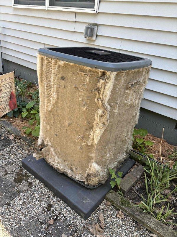 Responded to a no-cooling complaint on a residential air conditioning system installed in 2018. Upon arrival, discovered the outdoor condenser unit had severe exterior casing deterioration with extensive rust and corrosion that had compromised the structural integrity of the metal panels. Large sections of the housing showed advanced oxidation with material failure at multiple points. Measured supply air temperature at 83.3°F, confirming complete loss of cooling capacity. Documented the extensive corrosion damage to the condenser cabinet and the elevated return air temperature. The unit's deteriorated condition indicates the exterior damage has likely allowed moisture intrusion and environmental exposure that has affected internal components. System requires condenser unit replacement due to the extent of cabinet failure and inability to maintain proper cooling operation.
