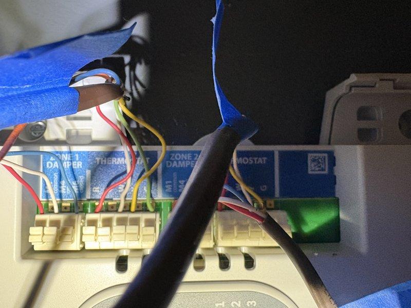 Replaced HVAC zone control panel and reconnected existing thermostat wiring to new terminal blocks. Performed system diagnosis and verified proper wiring connections for multi-zone damper control system, maintaining compatibility with existing thermostats throughout the property.
