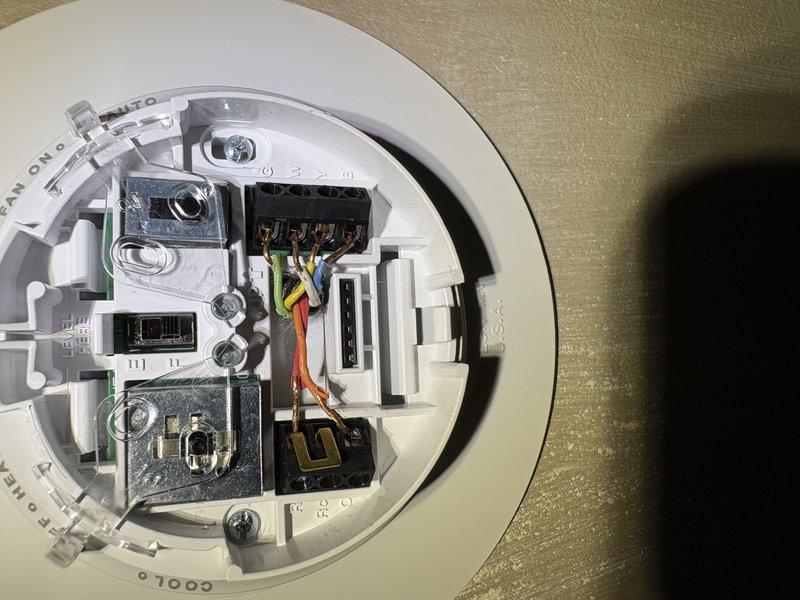 Replaced HVAC zone control panel and reconnected existing thermostat wiring to new terminal blocks. Performed system diagnosis and verified proper wiring connections for multi-zone damper control system, maintaining compatibility with existing thermostats throughout the property.
