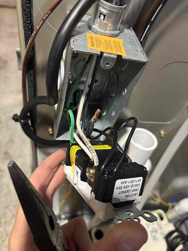 Responded to service call for newly installed air conditioning system with water pooling around unit on three sides and inadequate cooling performance. Inspected HVAC air handler installation, electrical connections, and condensate drainage system. Verified proper wiring configuration at junction box, examined PVC condensate drain line routing and trap assembly, and assessed overall system operation to identify source of water leakage and cooling deficiency.