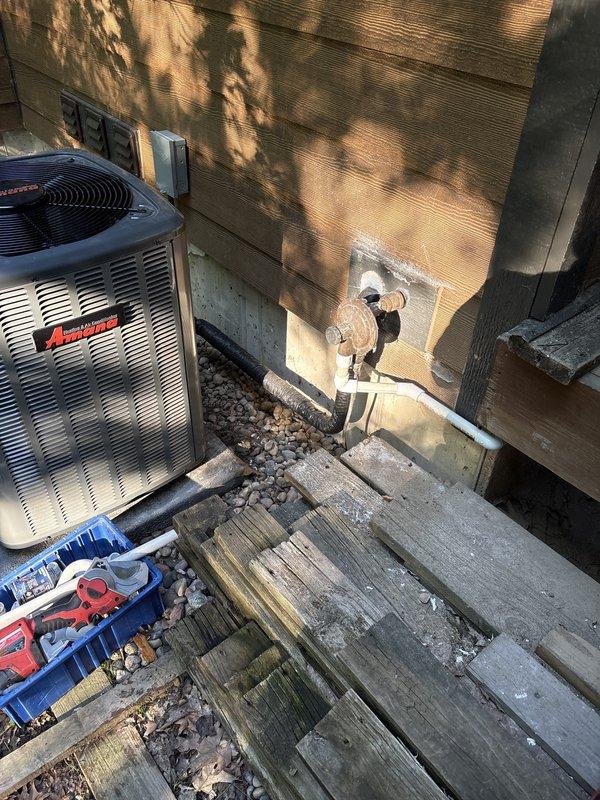 Completed inspector-required correction to relocate propane regulator piping to maintain minimum 3-foot clearance from air conditioning condenser unit per NFPA code requirements. Rerouted gas line under deck structure as requested to improve aesthetics while ensuring compliance with safety standards. Documented final installation with photographs and submitted to inspector for approval.