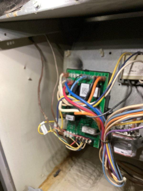 Replaced defective control board in HVAC air handler unit. Disconnected all field wiring from failed circuit board, removed old PCB showing signs of thermal damage, installed new control board, and reconnected all control wiring per manufacturer specifications to restore system operation.