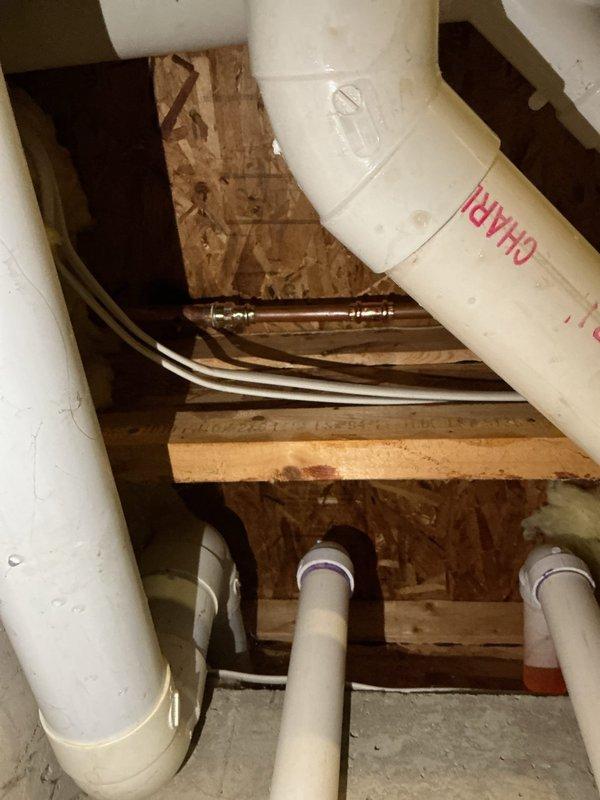 Replaced one frost-free exterior hose bib and repaired a second outdoor faucet on residential property. Work included accessing plumbing connections through crawl space, installing new frost-free spigot with proper PVC connections, and addressing issues with the secondary outdoor faucet to restore full functionality to both fixtures.