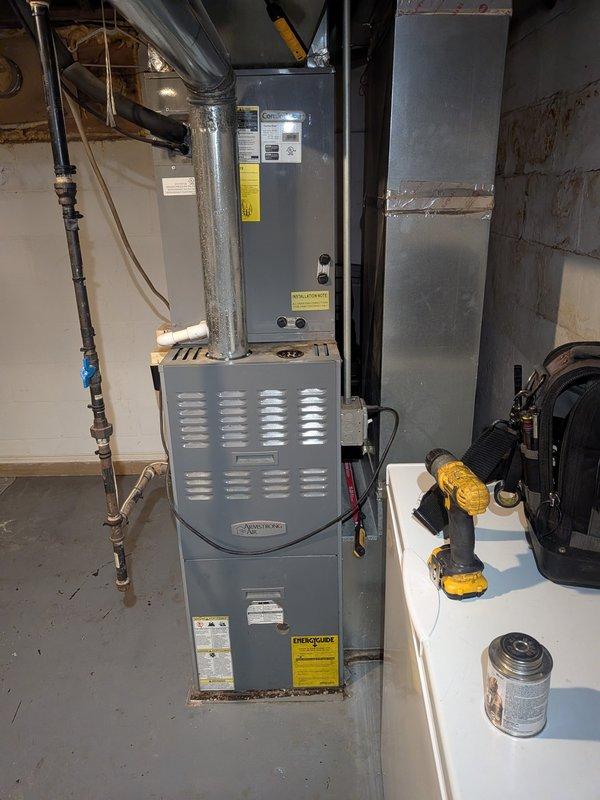 Responded to no cooling call with reports of low airflow and ice formation on refrigerant lines. Upon arrival, found evaporator coil frozen due to restricted airflow. Confirmed indoor blower operation and advised immediate filter replacement, as current filter was severely discolored and restricting system airflow. Instructed customer to leave system off with fan running to allow coil to thaw completely. Documented 15-year-old system condition and observed significant rust and corrosion on outdoor unit components, which will require monitoring for potential refrigerant line integrity issues.