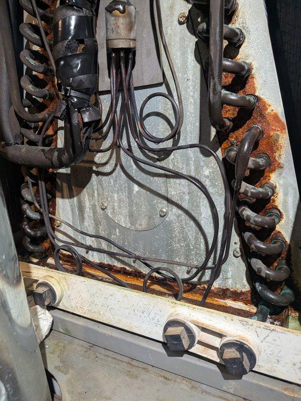 Responded to no cooling call with reports of low airflow and ice formation on refrigerant lines. Upon arrival, found evaporator coil frozen due to restricted airflow. Confirmed indoor blower operation and advised immediate filter replacement, as current filter was severely discolored and restricting system airflow. Instructed customer to leave system off with fan running to allow coil to thaw completely. Documented 15-year-old system condition and observed significant rust and corrosion on outdoor unit components, which will require monitoring for potential refrigerant line integrity issues.