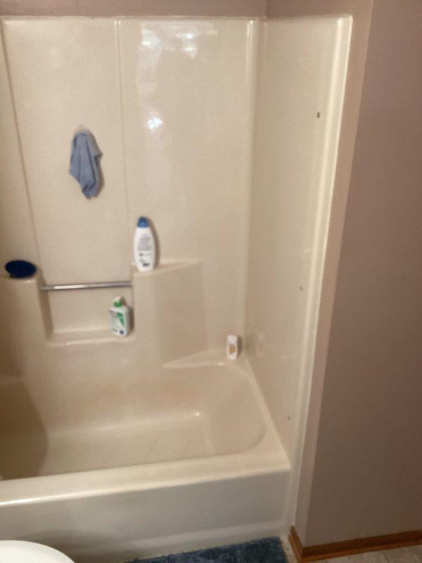 Completed comprehensive project estimate for full bathtub and shower surround replacement, including removal of existing fiberglass unit and chrome fixtures. Assessment included replacement of single-handle shower valve, tub spout, and showerhead with updated fixtures to meet current plumbing code requirements.