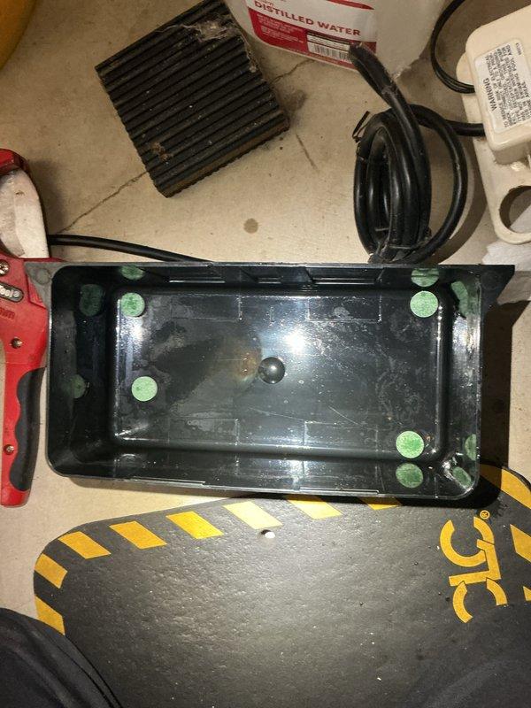 Completed annual cooling maintenance on 12-year-old EnergiAir system with 2018 condenser motor. Performed standard tune-up procedures including cleaning condensate drain pan which contained significant sediment and debris buildup, flushed drain line, inspected electrical connections, and verified system operation. All components functioning properly after service, photos documented pre-service conditions and work completed.