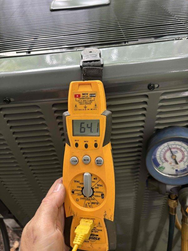 Completed full air conditioning system replacement. Removed existing unit and installed new AC system with all necessary refrigerant lines, electrical connections, and condensate drainage. Performed startup procedures and system commissioning, verifying proper refrigerant charge using manifold gauges showing appropriate pressures for R-410A refrigerant. Confirmed system operation with temperature differential readings of 64.1°F across the evaporator coil, indicating optimal cooling performance. All connections tested and secured, system operating within manufacturer specifications.