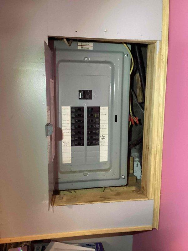 Conducted on-site assessment for adding a new AC unit to existing central air system. Evaluated electrical panel capacity and existing infrastructure to determine feasibility of additional air conditioning equipment installation. Documented current electrical panel configuration, available breaker spaces, and wire routing through ceiling joists to support estimate preparation for new AC unit addition.