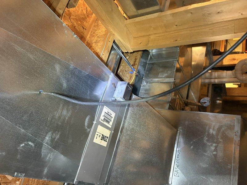 Responded to cooling complaint regarding inadequate airflow to upstairs area caused by air leakage at furnace. Upon inspection, identified compromised ductwork connections and unsealed joints at furnace plenum allowing conditioned air to escape into unconditioned space. Sealed all duct penetrations and connections at furnace cabinet using appropriate mastic and metallic tape. Verified proper airflow distribution to second floor registers and confirmed elimination of air leaks. System now operating efficiently with restored cooling capacity to upper level.