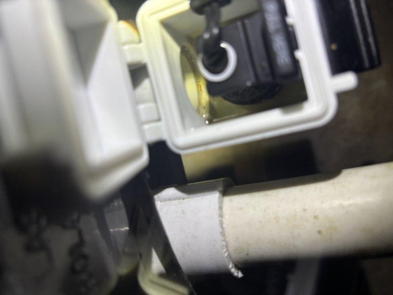Responded to cooling complaint on 1-year-old ENE WT 2-2035 system unable to maintain temperature below 73°F. Upon inspection, discovered condensate drain line improperly pitched, preventing adequate drainage and triggering safety float switch that was intermittently shutting down the system. Re-leveled and secured PVC drain line to proper slope using appropriate hangers and verified unrestricted water flow. Tested system operation through complete cooling cycle, confirmed proper drainage, and verified unit now cooling effectively to setpoint.