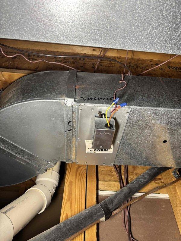 Responded to customer concern regarding newly installed air conditioning system overcooling the home. Upon inspection, confirmed that basement zone damper had been inadvertently left in the open position following recent installation, causing excessive cooling to lower level. Adjusted zone damper to proper closed position per customer's previous configuration preferences. Verified proper airflow distribution throughout remaining zones and confirmed system operation returned to expected comfort levels. Customer educated on zone damper operation for future reference.