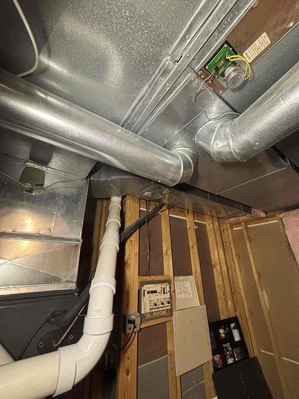 Responded to customer concern regarding newly installed air conditioning system overcooling the home. Upon inspection, confirmed that basement zone damper had been inadvertently left in the open position following recent installation, causing excessive cooling to lower level. Adjusted zone damper to proper closed position per customer's previous configuration preferences. Verified proper airflow distribution throughout remaining zones and confirmed system operation returned to expected comfort levels. Customer educated on zone damper operation for future reference.