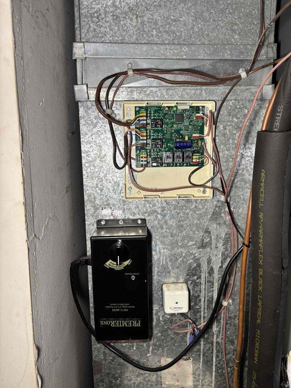 Responded to callback for AC unit continuing to ice over after previous repair with inadequate cooling. Upon inspection, identified failed or improperly functioning control board as root cause of persistent icing condition. Replaced defective control board and associated wiring connections. Installed Fieldpiece monitoring device to circuit for enhanced system diagnostics and performance tracking. Verified all electrical connections secure and properly terminated. Tested system operation to confirm proper cycling and temperature control restored to 10-year-old Napoleon unit.