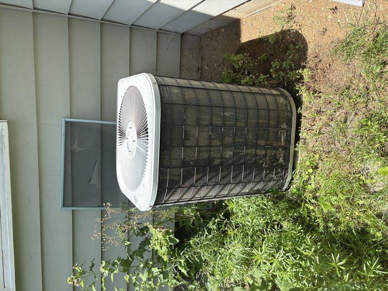 Responded to service call for water leak from furnace and air conditioning system not cooling properly. Inspected outdoor heat pump unit and identified condensate drainage issue. Verified proper leveling of condensate drain line using torpedo level to ensure adequate pitch for water flow. Addressed water leak concern and restored system to proper operating condition.