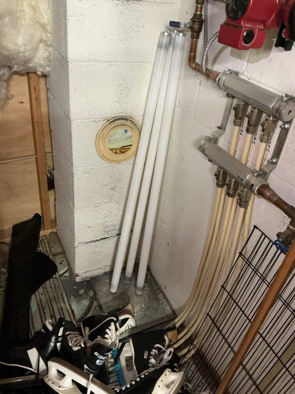 Responded to service call for 22-year-old Lochinvar boiler reported as non-operational with active leak. Upon arrival, inspected hydronic heating system including baseboard units and radiant floor heating manifold. Located leak source at circulator pump connection point on copper piping. Assessed manifold distribution system feeding multiple radiant floor zones with exposed tubing visible during flooring renovation. Repaired leaking connection, tested circulator pump operation, and verified proper flow through manifold to all heating zones. Confirmed boiler restored to normal operation with no additional leaks detected and system pressurized correctly.
