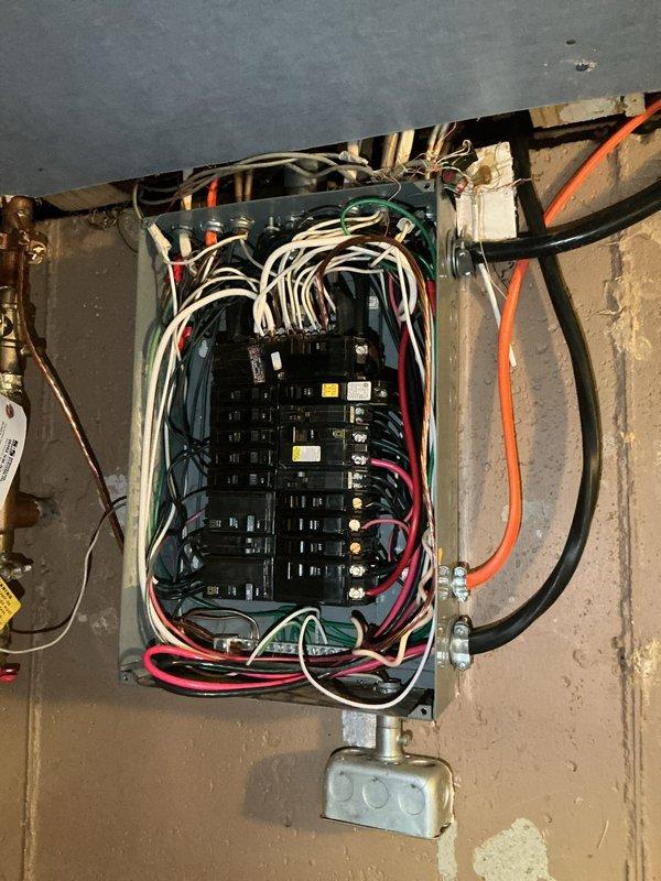 Responded to electrical issue where customer reported recurring problems following a January panel upgrade. Upon arrival, inspected exterior meter base and interior main electrical panel. Verified proper meter seating and connections at service entrance. Examined all breaker connections, bus bar contacts, and wire terminations within the main distribution panel. Found and corrected loose neutral connections that were causing intermittent power quality issues. Tightened all breaker mounting hardware and verified proper torque on main lugs. Tested voltage across all phases and confirmed balanced loads. Cycled breakers to verify proper operation and secure mounting. System now operating within normal parameters with stable voltage delivery to all circuits.