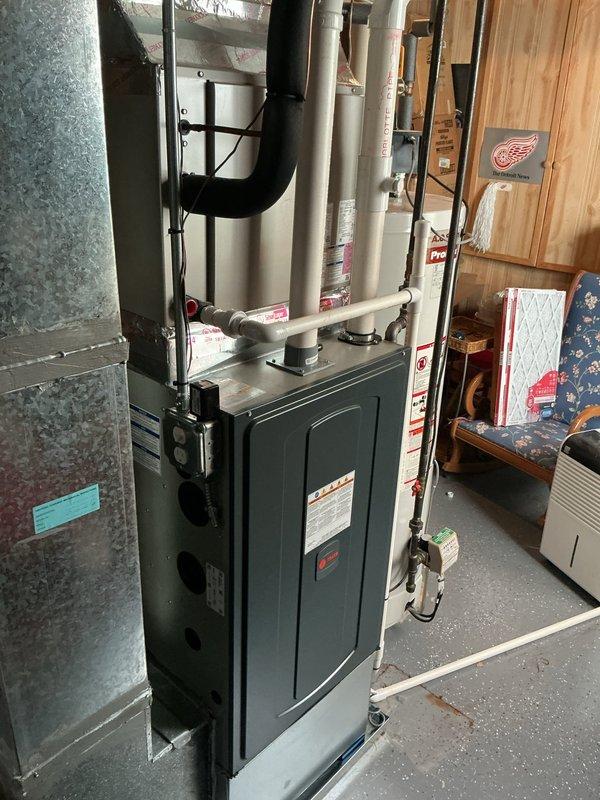 Responded to no cooling complaint on Bryant air conditioning system. Upon arrival, confirmed unit was running with adequate airflow but delivering insufficient cooling. Performed system diagnostics and inspected indoor furnace unit and associated components in basement mechanical room. Based on customer-reported symptoms of poor cooling performance despite normal operation and airflow, evaluated system for potential refrigerant loss or other cooling capacity issues. Documented equipment condition and installation configuration for further assessment of refrigerant charge and system performance.