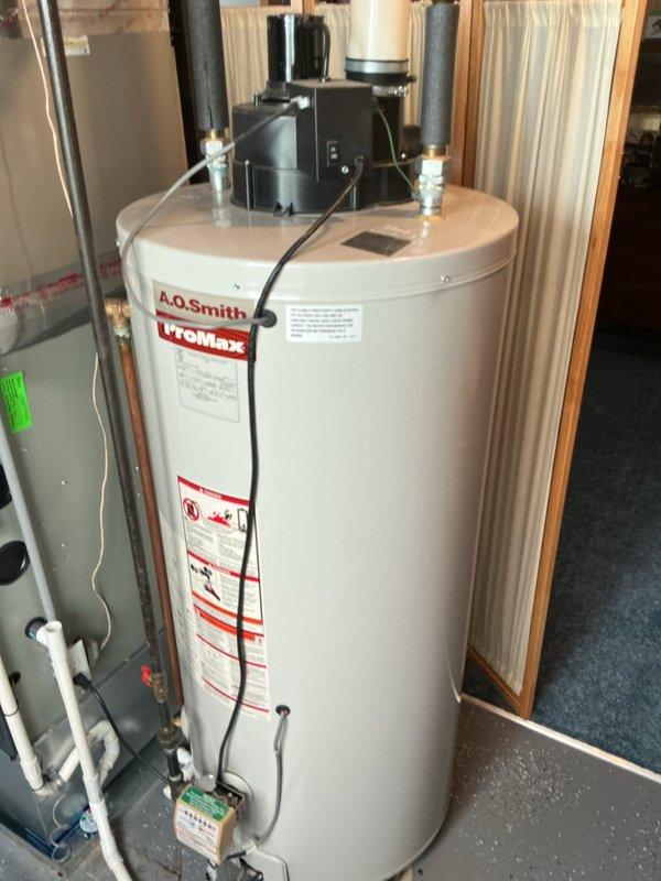 Responded to no cooling complaint on Bryant air conditioning system. Upon arrival, confirmed unit was running with adequate airflow but delivering insufficient cooling. Performed system diagnostics and inspected indoor furnace unit and associated components in basement mechanical room. Based on customer-reported symptoms of poor cooling performance despite normal operation and airflow, evaluated system for potential refrigerant loss or other cooling capacity issues. Documented equipment condition and installation configuration for further assessment of refrigerant charge and system performance.