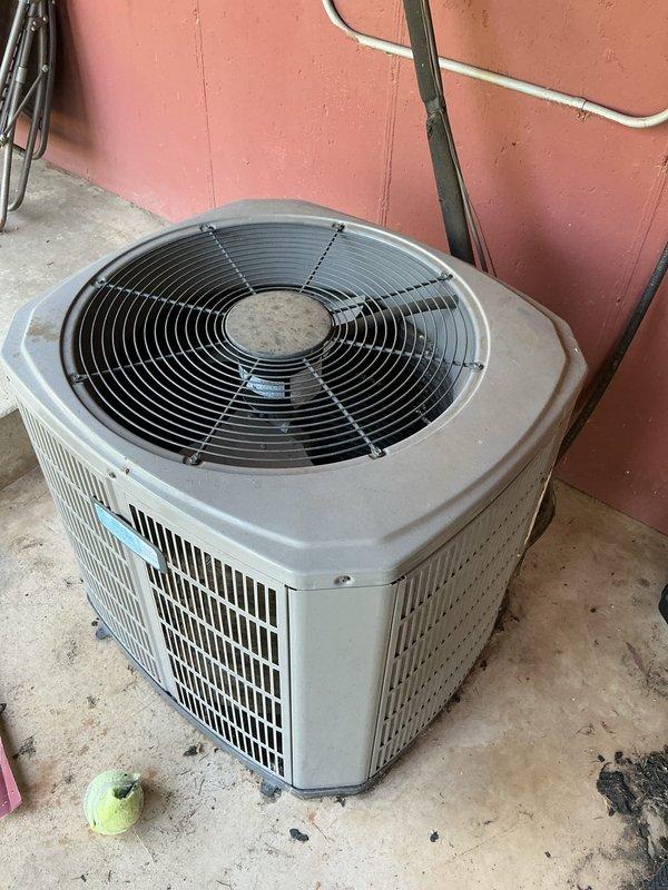 # NC-No Cool Service Completed

Responded to no cooling call with furnace fan operating but outdoor unit buzzing without compressor engagement. Upon inspection, found outdoor condenser unit experiencing electrical failure preventing compressor startup. Accessed outdoor unit and identified failed dual-run capacitor showing visible signs of deterioration, corrosion, and age-related failure. Capacitor tested out of specification and unable to provide necessary starting voltage to compressor motor, resulting in characteristic buzzing sound without rotation.

Removed defective capacitor and installed new dual-run capacitor with proper microfarad ratings for both compressor and condenser fan motor. Secured all electrical connections, verified proper wire routing, and ensured terminals were tight. Energized system and confirmed compressor started smoothly without buzzing. Verified condenser fan motor operation and proper amperage draw on both compressor and fan motor. Monitored system through
