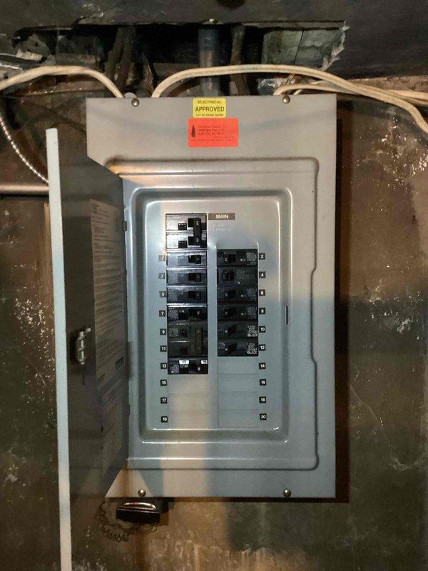 Completed on-site estimate for adding air conditioning system to residential property. Conducted thorough inspection and documentation of existing electrical infrastructure, including main service panel and circuit breaker configuration. Evaluated electrical capacity and panel conditions to determine compatibility with proposed AC installation, photographing panel layout, available breaker spaces, and incoming service wiring for system design and load calculation purposes.