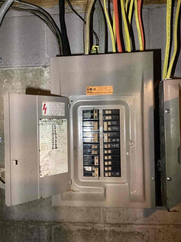 Completed sales estimate for ductless mini-split air conditioning system installation in residential property currently without cooling. Assessed electrical service panel capacity and routing requirements for multi-zone system consisting of three to four indoor air handlers serving two bedrooms, living room, and potentially basement area. Documented existing electrical infrastructure including main breaker panel configuration, available circuit capacity, and conduit pathways to determine installation feasibility and equipment specifications for proposed ductless heat pump system.