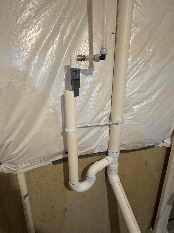 Responded to customer complaint of odor and gurgling noise from floor drain. Upon inspection, identified dry trap condition in floor drain assembly allowing sewer gases to enter living space. Poured water into floor drain to restore proper trap seal, eliminating odor source and resolving gurgling issue caused by negative air pressure in drainage system.