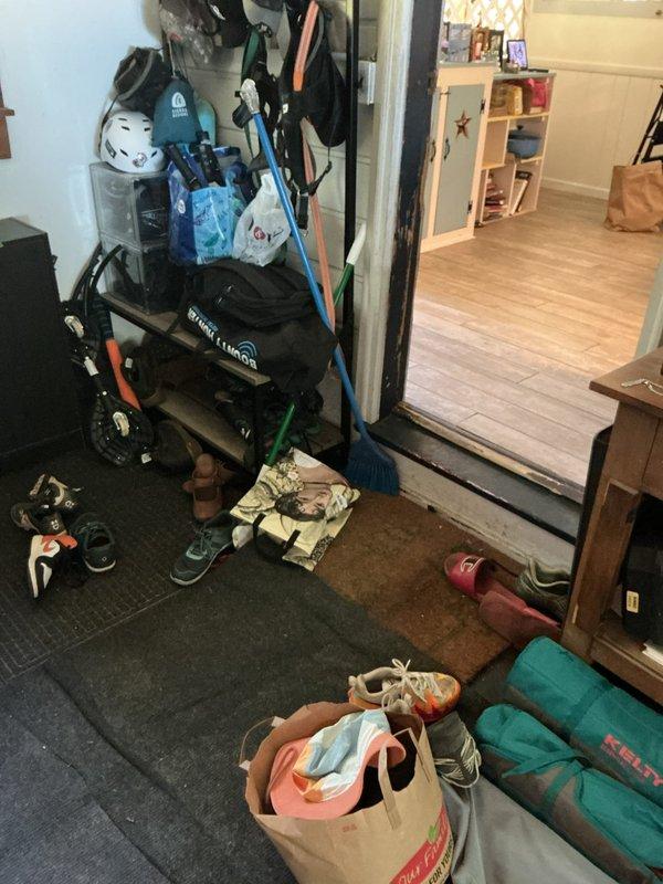 Responded to client request for estimate to extend hydronic heating system to sunroom addition. Assessed existing boiler system and photographed current mechanical room setup, including copper piping configuration, Amtrol expansion tank, and distribution manifold. Evaluated sunroom access point from main living area to determine routing requirements for new heating zone.