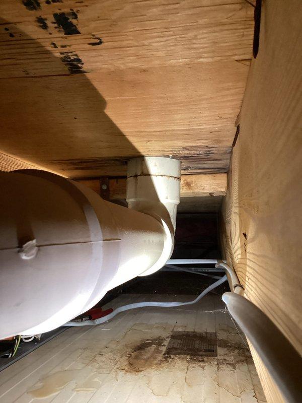 Completed new toilet installation in residential bathroom of 60-year-old home. Removed existing fixture and installed replacement unit, ensuring proper seating, secure floor flange connection, and verified all plumbing connections for leak-free operation. Inspected crawl space beneath bathroom to confirm drain line integrity and proper waste line pitch. Tested flush mechanism and water supply line for proper function upon completion.