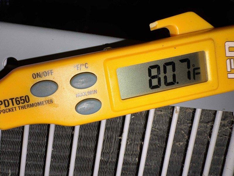 # No Cool Service Call

Responded to a no cooling complaint on a 20-year-old system with a non-spinning outdoor fan. Upon arrival, confirmed the indoor temperature was elevated at 80.7°F and the condenser fan motor was inoperative. Performed diagnostic testing of the electrical system and identified a failed run capacitor. Measured voltage and capacitance values, confirming the capacitor was out of specification and preventing the fan motor from starting. Replaced the defective dual run capacitor with a new unit, ensuring proper wire connections to the compressor and fan motor terminals. Verified all electrical connections were secure and tested system operation. Condenser fan motor started successfully, and the system began cooling properly. Monitored system performance to ensure proper operation and temperature reduction. System restored to normal cooling operation.