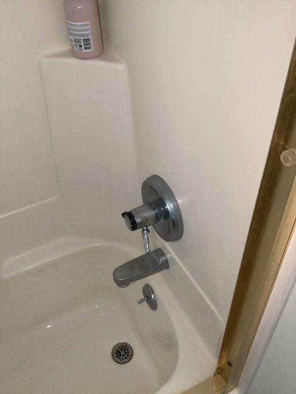 Responded to customer report of three dripping faucets throughout a 33-year-old residence. Inspected bathroom tub spout with diverter assembly and additional fixture locations to identify source of leaks. Assessed worn internal components typical of aging plumbing fixtures. Performed necessary repairs to eliminate dripping at all affected faucet locations, restoring proper water shut-off function and preventing water waste.