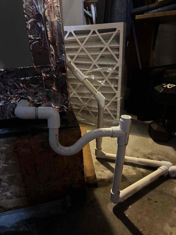 Responded to cooling complaint on 7-year-old Goodman heat pump system. Upon arrival, found significant water pooling on basement floor near air handler unit, indicating condensate drainage issue. Inspected condensate drain system and identified blockage in PVC drain line preventing proper water evacuation. Cleared obstruction from condensate piping and verified proper drainage flow. Checked air filter condition and found adequate airflow through return system. Tested system operation in cooling mode and confirmed unit cycling properly with adequate cooling capacity. System returned to normal operation with resolved drainage issue.