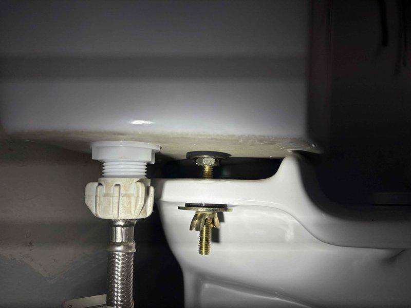 Responded to toilet leaking at base following recent installation. Upon inspection, found improper seal between toilet and flange. Removed toilet, cleaned flange surface, installed new wax ring, and reset toilet with proper bolts and hardware. Verified secure mounting and tested for leaks with multiple flushes. No leaks detected upon completion.