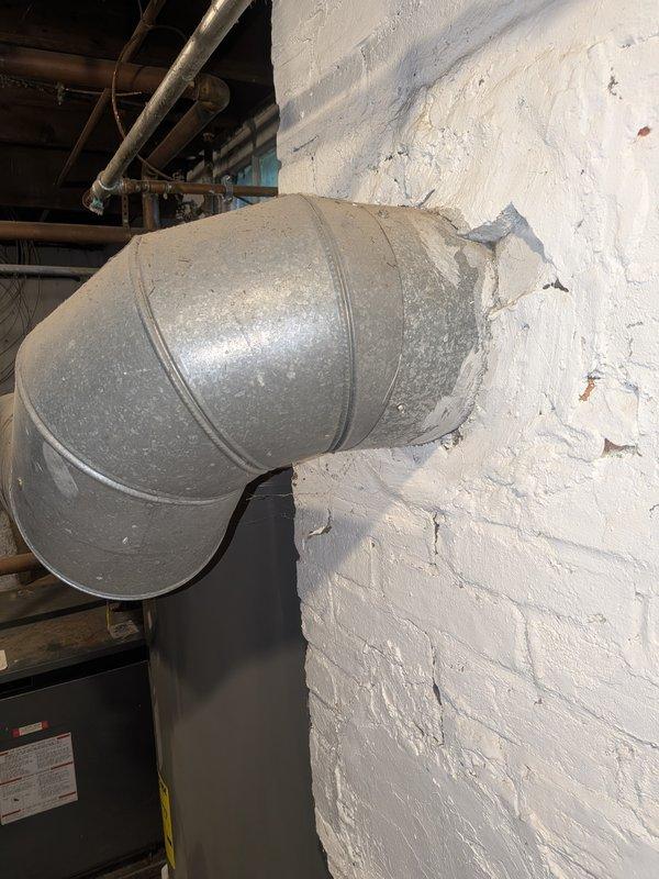 Responded to service call for non-operational boiler system approximately 40 years old. Conducted thorough inspection of heating unit and associated components. Visual examination revealed significant corrosion and rust on heat exchanger frame and casing, indicating extended service life and moisture exposure. Heat exchanger fins showed surface oxidation but remained structurally intact. Evaluated ductwork connections and basement installation conditions. Documented equipment condition through photography and provided customer with assessment findings and repair versus replacement options given the age and deteriorated state of the system.