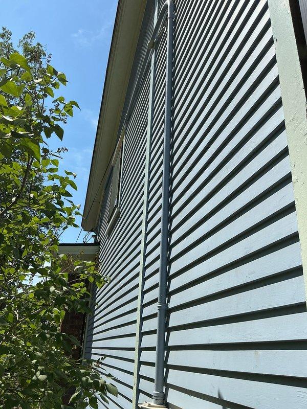 Conducted comprehensive electrical service evaluation for century-old two-story duplex to assess current system capacity and code compliance in preparation for potential mini-split air conditioning installation in upper unit. Inspected existing dual-meter configuration, service entrance conductors, exterior conduit runs, and main electrical panels to determine adequacy of current amperage rating and identify necessary upgrades to support increased electrical loads and meet current National Electrical Code requirements.